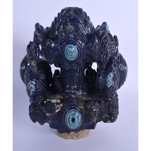 1502 - A RARE 17TH CENTURY CHINESE FAHUA GLAZED POTTERY GROTTO Ming, modelled with two scholars within a mo... 