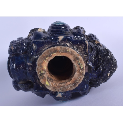 1502 - A RARE 17TH CENTURY CHINESE FAHUA GLAZED POTTERY GROTTO Ming, modelled with two scholars within a mo... 