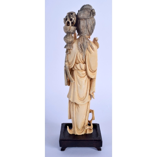 1534 - A LATE 19TH CENTURY CHINESE CARVED IVORY IMMORTAL Qing, modelled holding a bamboo pole. Ivory 18.5 c... 