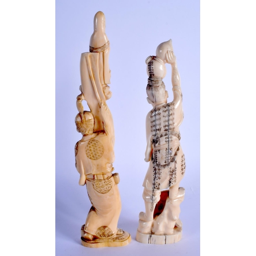 1548 - A PAIR OF 19TH CENTURY JAPANESE MEIJI PERIOD CARVED IVORY OKIMONO. Largest 25 cm high.