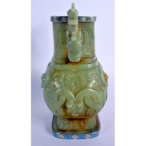 1575 - A CHINESE TWIN HANDLED JADE VASE 20th Century, with Continental silver mounts, decorated with foliag... 