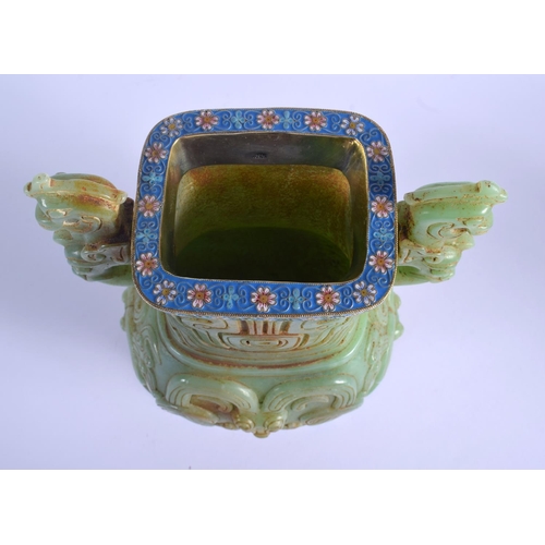 1575 - A CHINESE TWIN HANDLED JADE VASE 20th Century, with Continental silver mounts, decorated with foliag... 