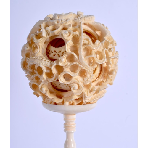 1577 - A 19TH CENTURY CHINESE CANTON IVORY PUZZLE BALL ON STAND Qing. 30 cm high.