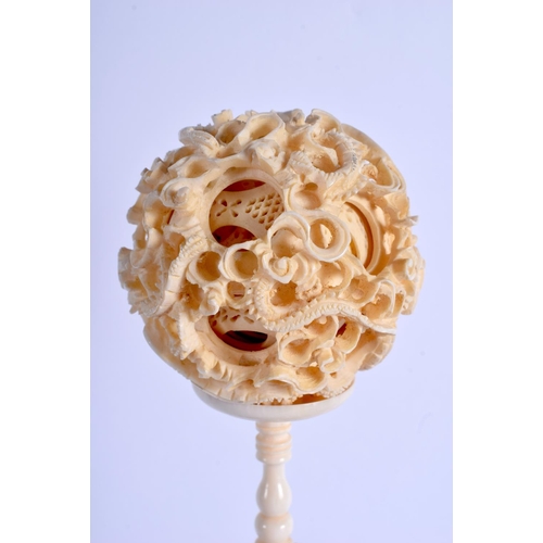 1577 - A 19TH CENTURY CHINESE CANTON IVORY PUZZLE BALL ON STAND Qing. 30 cm high.