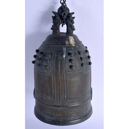 1580 - AN 18TH CENTURY JAPANESE EDO PERIOD BRONZE BELL with dimpled decoration. 33 cm x 16 cm.