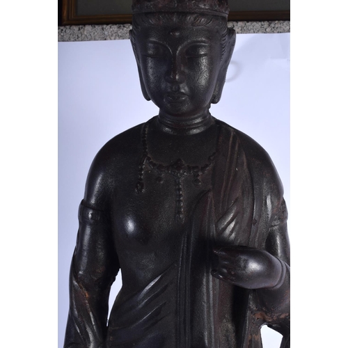 1581 - A LARGE 18TH CENTURY CHINESE IRON FIGURE OF A BUDDHISTIC DEITY Qing, modelled upon a lotus base. Iro... 