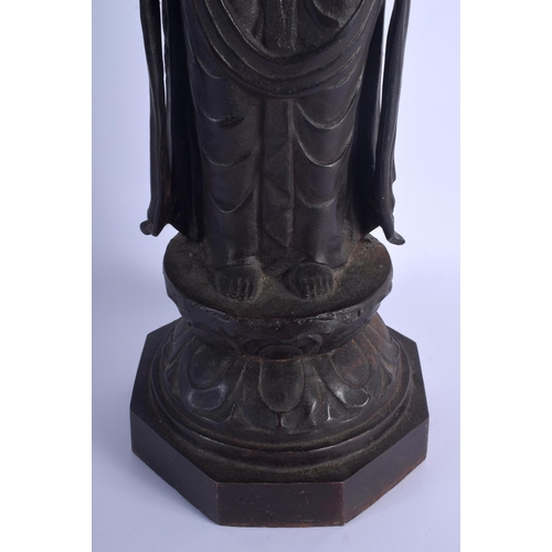 1581 - A LARGE 18TH CENTURY CHINESE IRON FIGURE OF A BUDDHISTIC DEITY Qing, modelled upon a lotus base. Iro... 