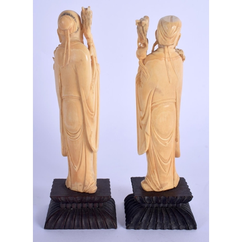 1587 - A PAIR OF 19TH CENTURY CHINESE CARVED IVORY IMMORTALS Qing. Ivory 14 cm high.