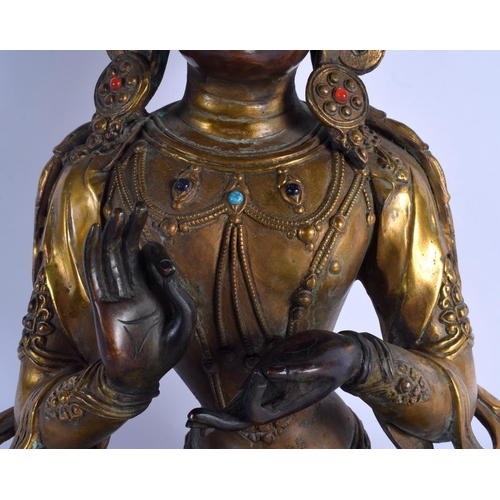 1603 - A VERY LARGE CHINESE TIBETAN GILT BRONZE FIGURE OF A BUDDHA 20th Century, inset with jewels. 44 cm x... 