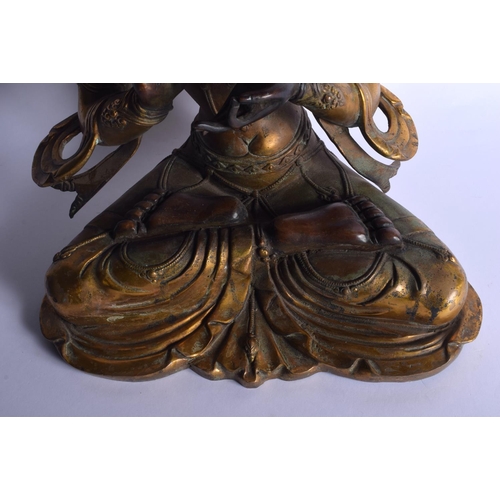 1603 - A VERY LARGE CHINESE TIBETAN GILT BRONZE FIGURE OF A BUDDHA 20th Century, inset with jewels. 44 cm x... 