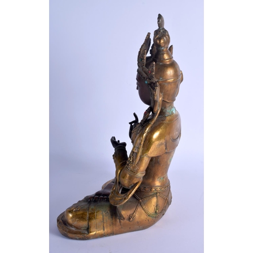 1603 - A VERY LARGE CHINESE TIBETAN GILT BRONZE FIGURE OF A BUDDHA 20th Century, inset with jewels. 44 cm x... 