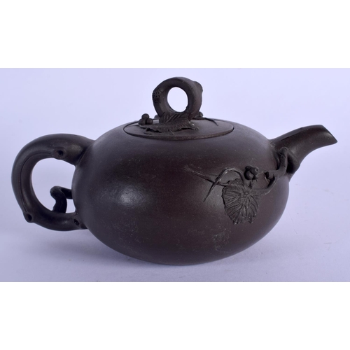 1608 - A CHINESE YIXING POTTERY TEAPOT AND COVER 20th Century. 15 cm wide.