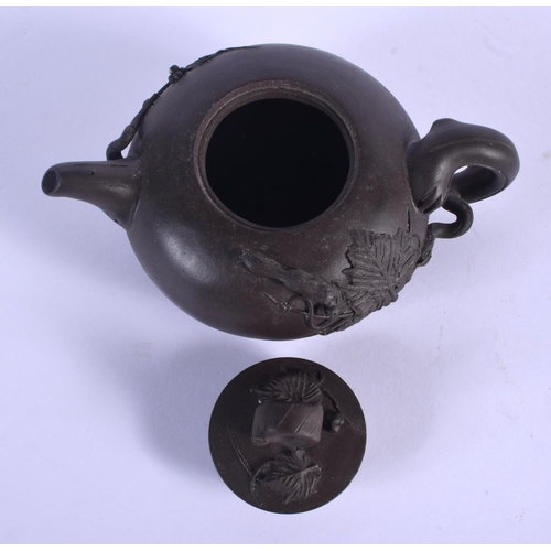 1608 - A CHINESE YIXING POTTERY TEAPOT AND COVER 20th Century. 15 cm wide.