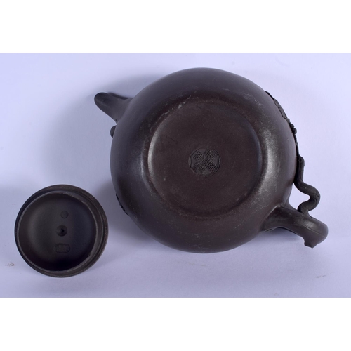 1608 - A CHINESE YIXING POTTERY TEAPOT AND COVER 20th Century. 15 cm wide.