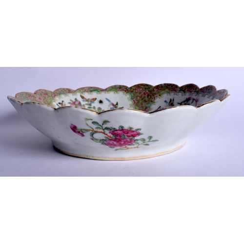 1613 - A 19TH CENTURY CHINESE CANTON FAMILLE ROSE BARBED BOWL Qing, painted with flowers. 22 cm wide.