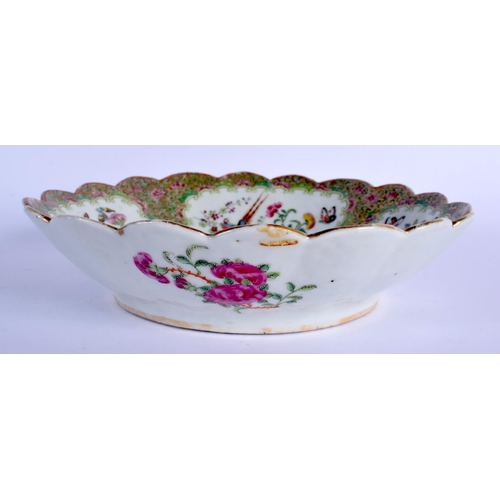 1613 - A 19TH CENTURY CHINESE CANTON FAMILLE ROSE BARBED BOWL Qing, painted with flowers. 22 cm wide.