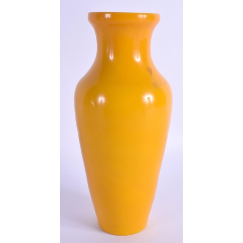 1616 - A 19TH CENTURY CHINESE PEKING GLASS TAPERING VASE Qing, of plain slender form. 21.5 cm high.