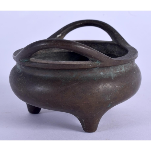 1625 - AN 18TH/19TH CENTURY CHINESE TWIN HANDLED BRONZE CENSER bearing Xuande marks to base, with internal ... 