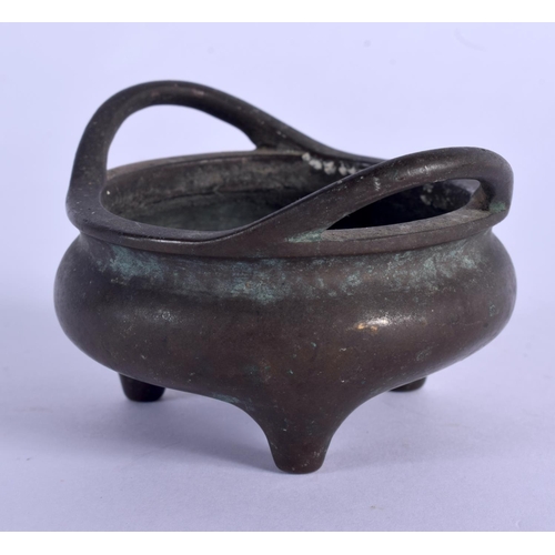 1625 - AN 18TH/19TH CENTURY CHINESE TWIN HANDLED BRONZE CENSER bearing Xuande marks to base, with internal ... 