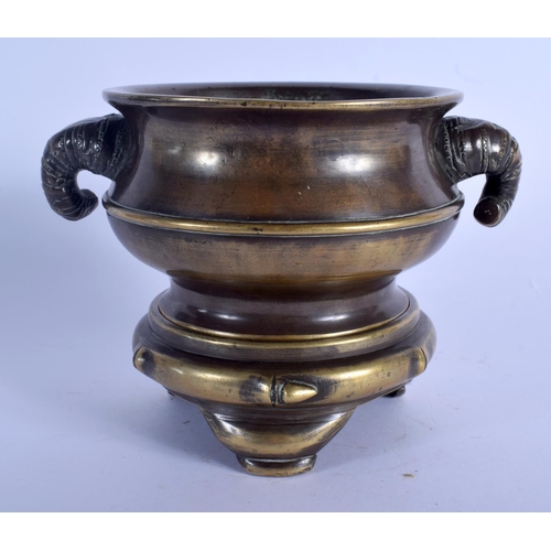 1629 - A RARE 19TH CENTURY CHINESE BRONZE CENSER ON STAND Qing, formed with bamboo type handles, of natural... 