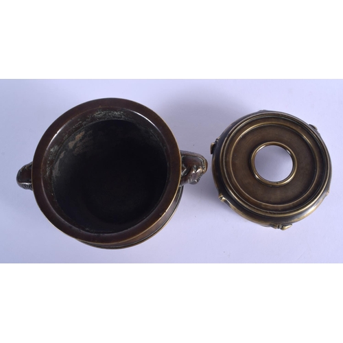 1629 - A RARE 19TH CENTURY CHINESE BRONZE CENSER ON STAND Qing, formed with bamboo type handles, of natural... 