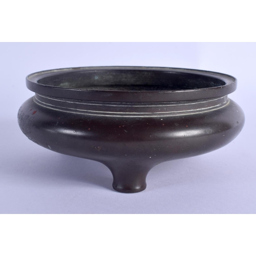 1642 - AN 18TH CENTURY CHINESE CIRCULAR BRONZE CENSER Qing, bearing Xuande marks to base. 895 grams. 12.5 c... 