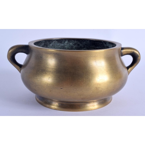 1643 - AN 18TH CENTURY CHINESE TWIN HANDLED BRONZE CENSER Qing, bearing Xuande marks to base. 988 grams. 16... 