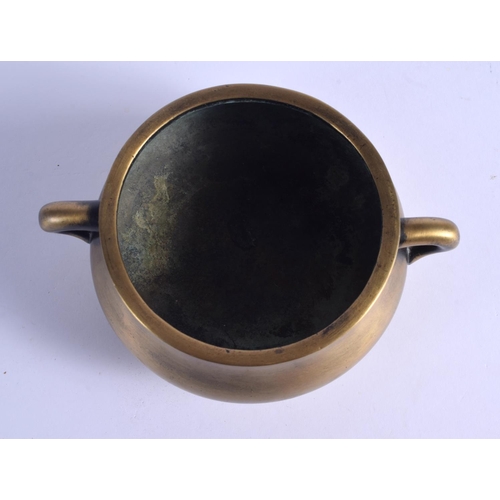 1643 - AN 18TH CENTURY CHINESE TWIN HANDLED BRONZE CENSER Qing, bearing Xuande marks to base. 988 grams. 16... 