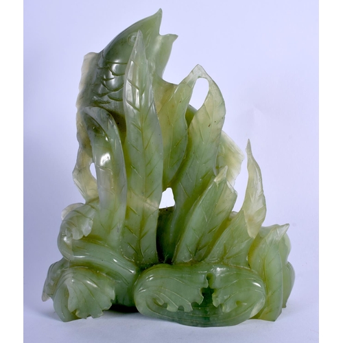 1654 - AN EARLY 20TH CENTURY CHINESE CARVED JADE FIGURE OF A FISH Late Qing/Republic. 18 cm x 15 cm.