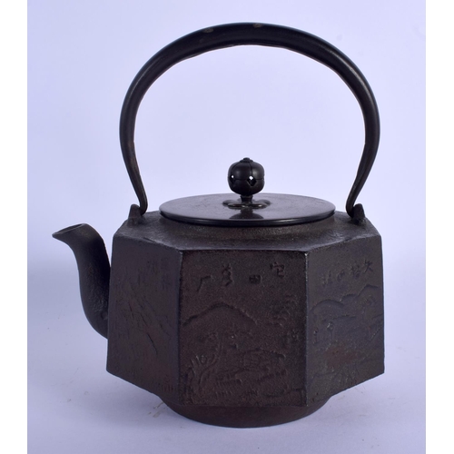 1659 - A 19TH CENTURY JAPANESE MEIJI PERIOD CAST IRON AND BRONZE TEAPOT decorated with landscapes. 16 cm x ... 