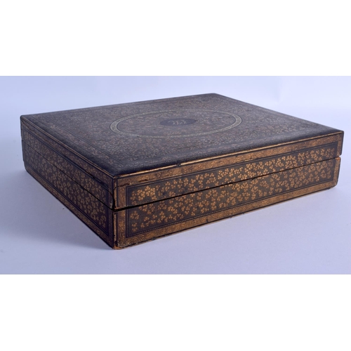 1660 - A LARGE EARLY 19TH CENTURY CHINESE EXPORT BLACK LACQUER GAMING BOX AND COVER containing numerous mot... 