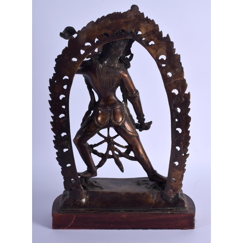 1680 - A LARGE EARLY 20TH CENTURY INDO TIBETAN NEPALESE BRONZE BUDDHA modelled in front of a flaming surrou... 