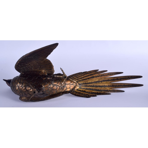 1687 - A 19TH CENTURY JAPANESE PATINATED BRONZE FIGURE OF A ROAMING PHEASANT of naturalistic form, modelled... 