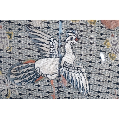 1691 - A CHINESE QING DYNASTY FRAMED SILK RANK BADGE depicting a bird in flight. Silk 30 cm square.