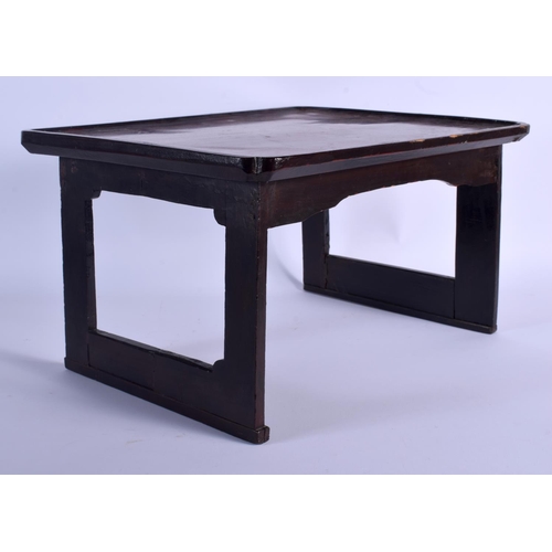 1692 - AN EARLY 20TH CENTURY CHINESE KOREAN SOFTWOOD LOW TABLE of small proportions. 26 cm x 42 cm.