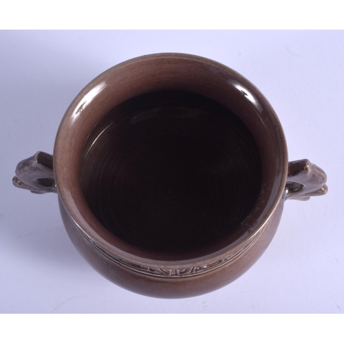 1701 - AN EARLY 20TH CENTURY CHINESE TWIN HANDLED AUBERGINE GLAZED CENSER Late Qing, bearing Qianlong marks... 