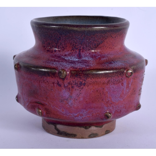 1704 - A CHINESE PURPLE JUNYAO GLAZED STONEWARE JARLET 20th Century. 9 cm wide.