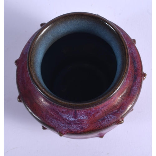 1704 - A CHINESE PURPLE JUNYAO GLAZED STONEWARE JARLET 20th Century. 9 cm wide.