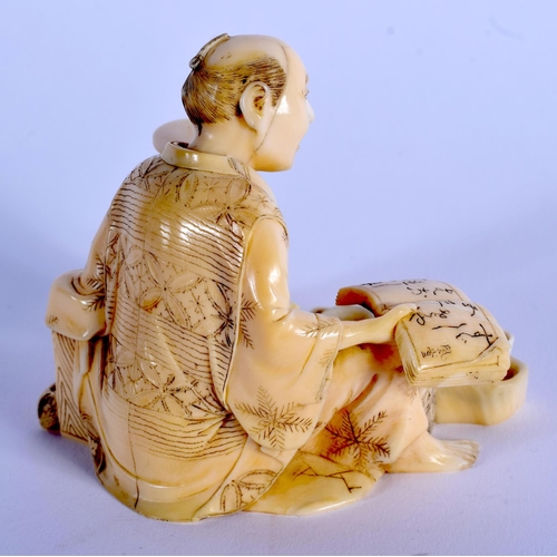 1716 - A 19TH CENTURY JAPANESE MEIJI PERIOD CARVED IVORY OKIMONO modelled as an artisan. 8 cm x 7 cm.