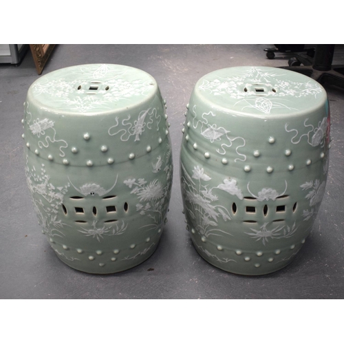 1737 - A LARGE PAIR OF 19TH CENTURY CHINESE CELADON SLIP GLAZED BARREL FORM GARDEN SEATS Qing, painted with... 