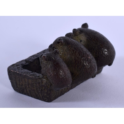 1752 - A JAPANESE BRONZE PIG TROUGH OKIMONO. 4 cm x 3 cm.