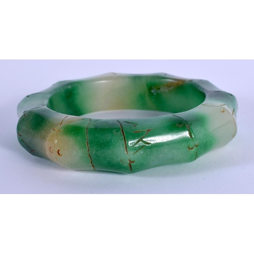 1754 - A CHINESE JADE BANGLE 20th Century. 8.5 cm wide.