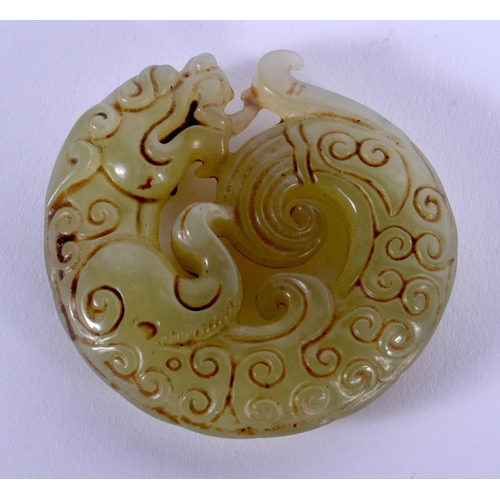 1755 - A CHINESE JADE ROUNDEL. 4.5 cm wide.