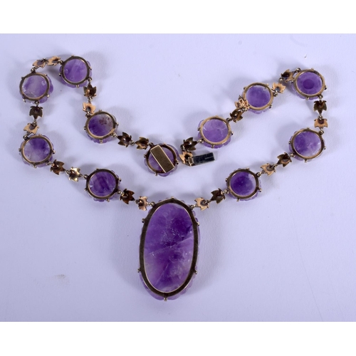 1760 - AN EARLY 20TH CENTURY CHINESE GOLD MOUNTED AMETHYST NECKLACE Late Qing. 40 cm long.