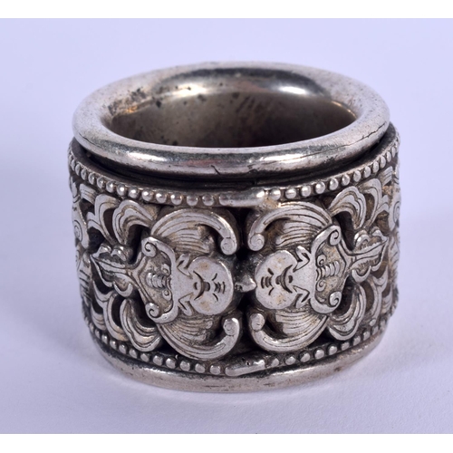 1761 - A CHINESE WHITE METAL ARCHERS RING. 2.75 cm wide.