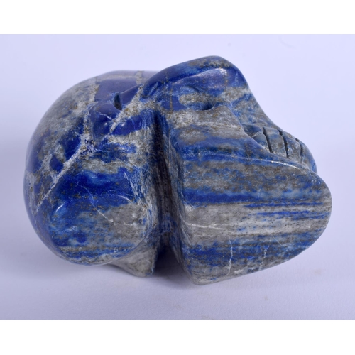 1771 - A CHINESE CARVED LAPIS LAZULI MODEL OF A SKULL 20th Century. 6.5 cm x 6.5 cm.