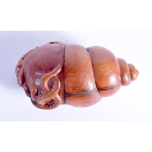 1777 - A JAPANESE CARVED BOXWOOD OCTOPUS SHELL BOX AND COVER. 11 cm x 5 cm.