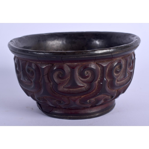 1782 - A RARE 17TH CENTURY CHINESE CARVED RED TIXI LACQUER BOWL Ming, carved with motifs. 9.5 cm wide. Note... 