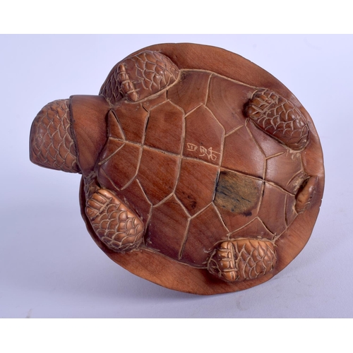 1789 - A JAPANESE CARVED WOOD FIGURE OF A TORTOISE modelled with three tortoise upon its back. 10 cm x 8 cm... 