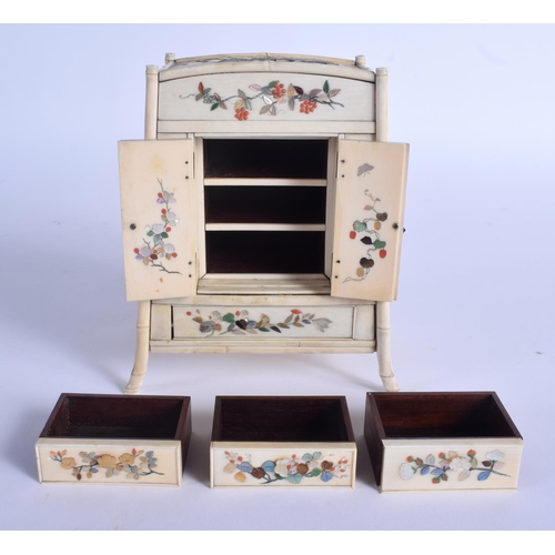 1794 - A 19TH CENTURY JAPANESE MEIJI PERIOD CARVED SHIBAYAMA IVORY CABINET decorated with birds and foliage... 